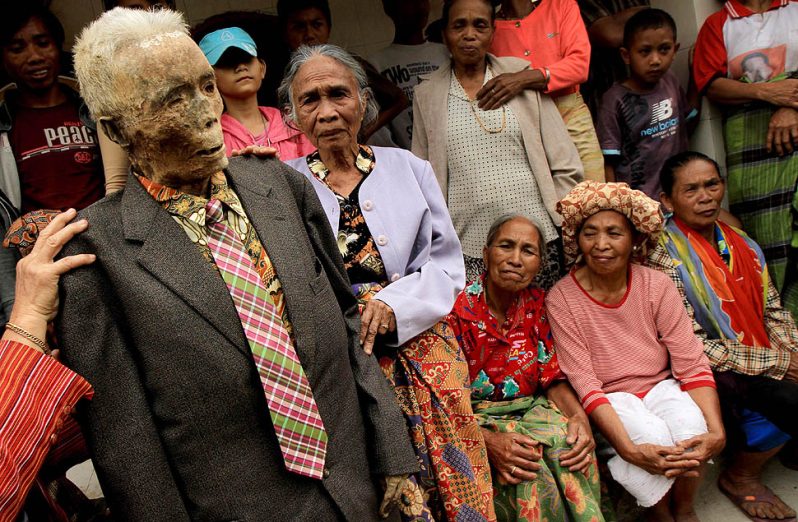 In Indonesia, there's a tradition of routinely changing mummies' clothes every three years. Interesting, isn't