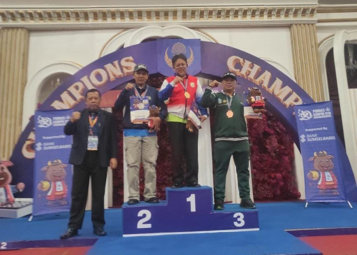 Guru SMPN 1 Kota Bengkulu Raih Medali Emas Pornas Korpri