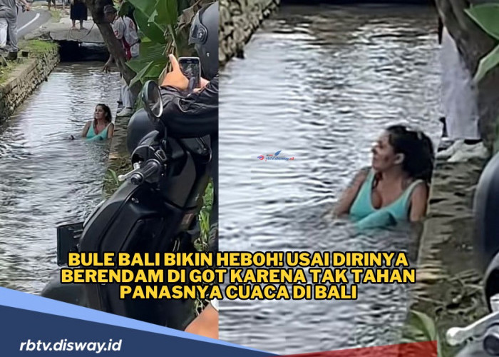 Bule Pakai Dres Hijau Tosca Berendam di Selokan Pinggir Jalan Raya, Aksinya Viral